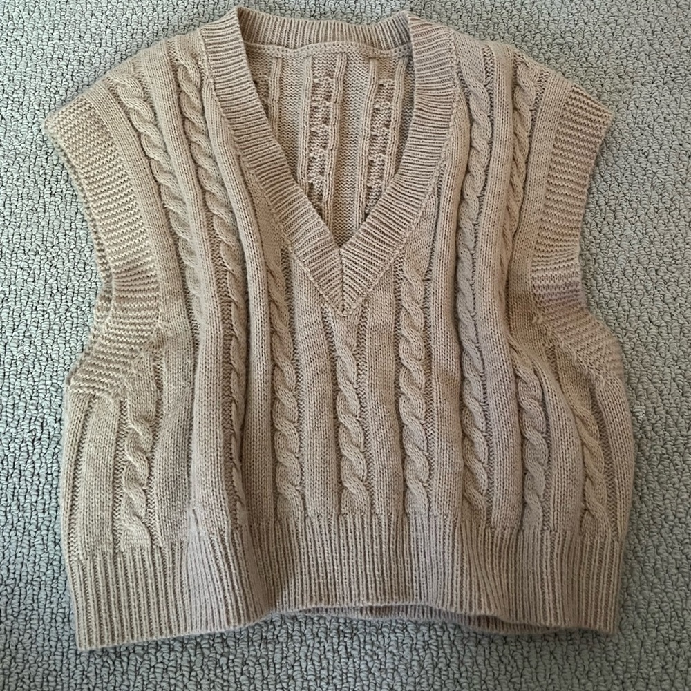 sweater vest sorta cropped but not a lot